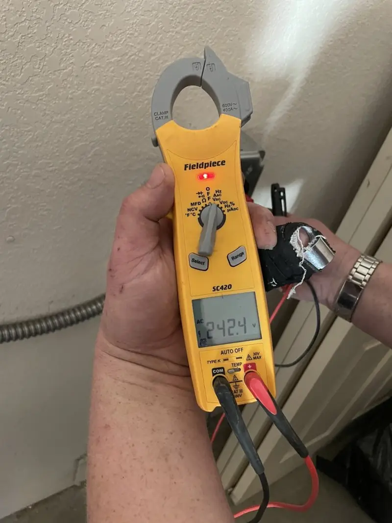 Voltage testing with clamp meter during Aluminum Wiring Replacement in Vadnais Heights